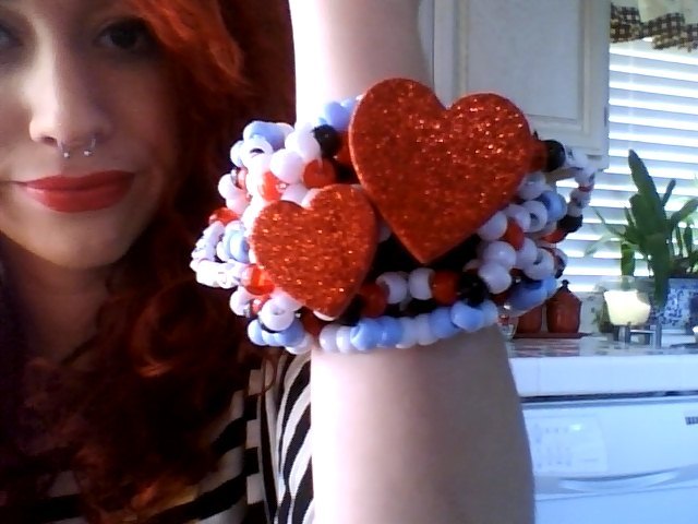 Queen of Hearts cuff I made for Kerah for Beyond. It says &ldquo;Off with your