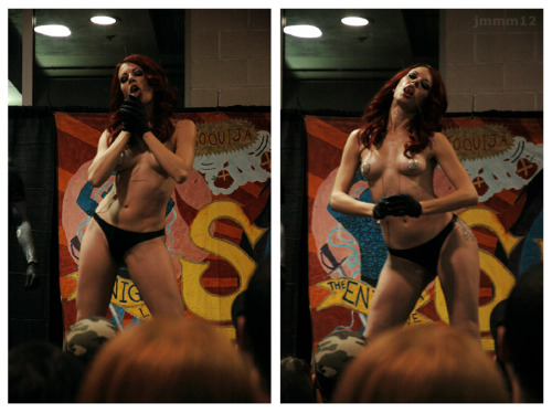 Miss Crash, self piercing on stage at the Philadelphia Tattoo Arts Convention 2012. by jonmmmayhem h