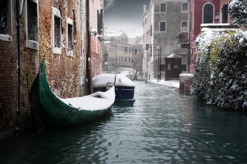 by Giuseppe Desideri on Flickr. Gondolas covered in snow, a rare view in Venice, Italy.