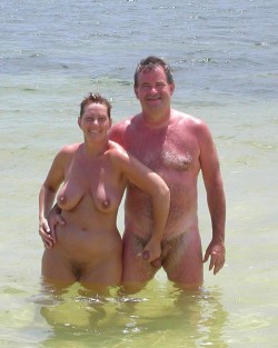  This nudist woman is keeping hold of her