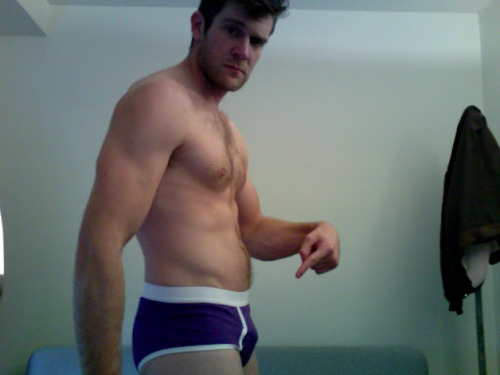 pressipiss:  This is from Colby Keller’s “Purple People Eater” video on Youtube which you really have to see…to believe.  Also, check out his other videos where he gets all Foucault on yr ass and says “heteronormativity” a lot.