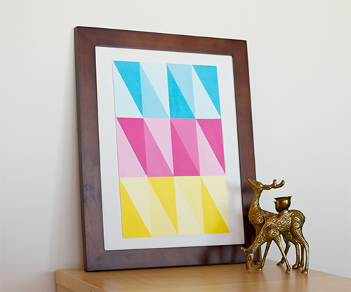 Wall Art Triangles | Mr Handsome Face
If you can stick tape and use a paintbrush, you can make this! It reminds me of a paint by numbers kit - choose your two favourite colours and then using them in three shades paint the corresponding triangles....