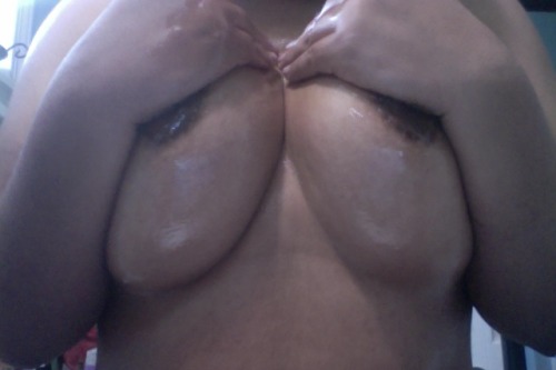 vickim88:  Oiled up boobs for Topless Tuesday!! :)