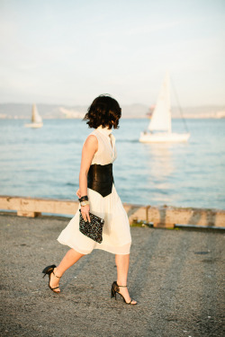  Dress: Topshop; Leather corset: Alexander Wang; Shoes: Valentino; Sunglasses: Karen Walker; Bag: Zara; Necklace: Mynamenecklace.com; Jewelry: Michael Kors watch, Gap leather wrap bracelet 