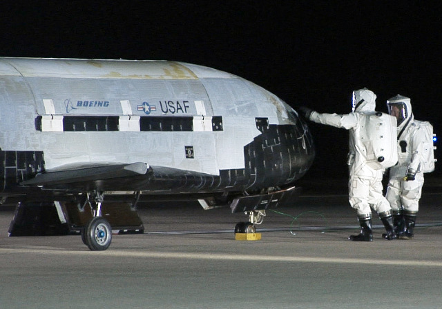The military won’t say what it has been doing with its experimental miniature space shuttle, but the pilotless spaceship, known as the X-37B, has been in orbit for a year now. The 29-foot robotic spacecraft, also known as the Orbital Test Vehicle, or...
