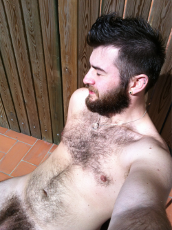 queerrilla:  In Barcelona you can sunbathe on the roof in March. Two thumbs up!  Holy good goddamn, Stefano.