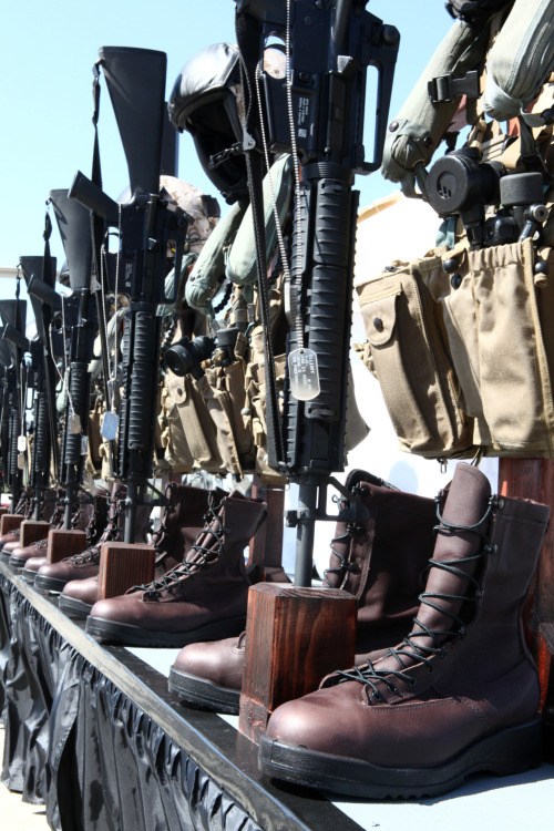 Military battle crosses are set up as a symbolic representation honoring fallen Marines aboard Marine Corps Air Station Camp Pendleton, Calif., March 2. A memorial service was held honoring six Marines from Marine Light Attack Helicopter Squadron 469...