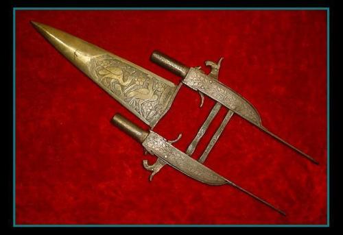 firearmshots:Indo-Persian Katar punch dagger with twin mounted .50 caliber black powder muskets. Fin