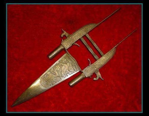 firearmshots:Indo-Persian Katar punch dagger with twin mounted .50 caliber black powder muskets. Fin