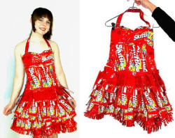 theguythatwearstwofaces:  Skittles Wrapper Dress 15 hours and 101 Skittle wrappers after, Craftster user Theperilouspopsicle finished her Prom dress made entirely out of this candy wrappers. 