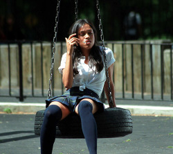 barbiesdontworkatarbys:  2000ish:   Rosario Dawson smoking in a schoolgirl outfit.   