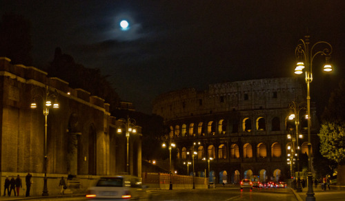 Full moon over the Roman Colosseum.