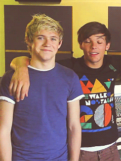  #niall always looks happiest tucked under their arms :) 
