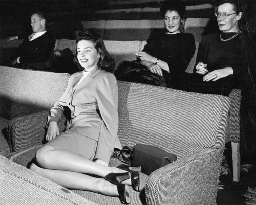 susiesnapshot:  Movie theatre with loveseats, 1946.