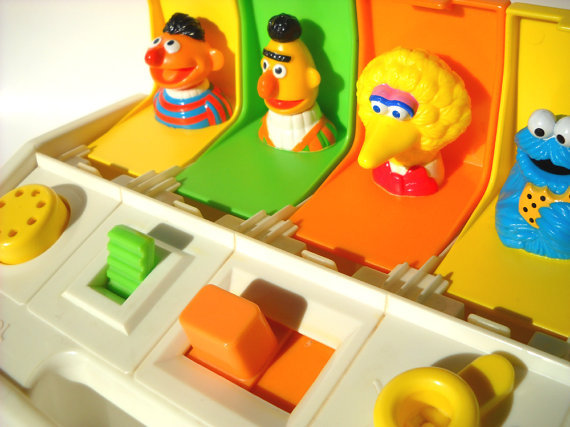 toysofthe80s:  1980s Sesame Street Poppin Pals Baby Toy  I had this oh god