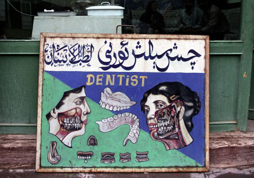 ronwurzer:Sign at Uyghur dentist office,  Xinjiang Province, China, 2002.  