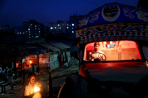 greenshirts-blog:A truck parked outside a road-side stall in Dhaka, Bangladesh.