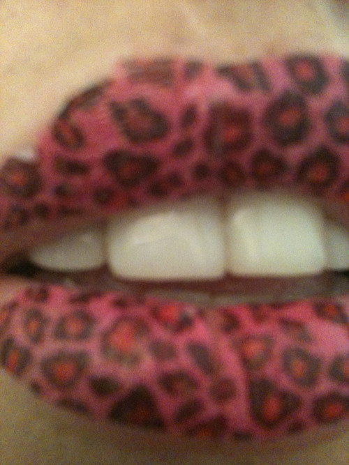 Having fun creating awesome nails and even trying out a lip tattoo!