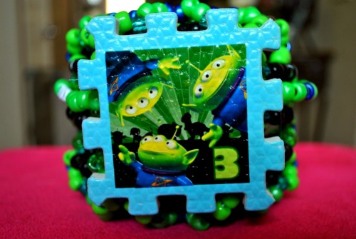 Toy Story Green Alien cuff I made for my BFF. It says “The claw.” <33
