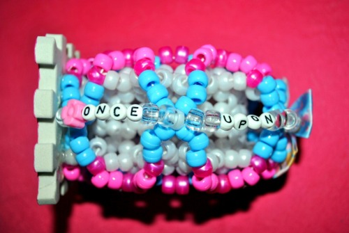 Cinderella cuff I made Agustina. It says “Once upon a time…” c;