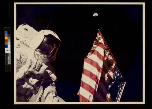 Harrison Schmitt on the Moon during Apollo 17, with the Earth in view