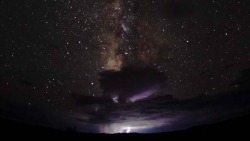 expose-the-light:  An incredible view of the Milky Way stretched above a distant monsoon Earth and space combine to create a striking image from photographer Bret Webster. The Milky Way almost looks as though it’s come crashing through our atmosphere