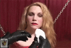 lipstickandlatex:  Pretty sub is heavily gagged by her mistress. Click here to view