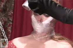 lipstickandlatex:  Pretty sub is heavily gagged by her mistress. Click here to view