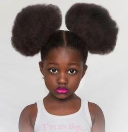 blackandkillingit:  iamnotagolddiggah:  My goooowssh, look at that face. She’s just too cute! And i’m in love with her hair.  Black Girls Killing It Shop BGKI NOW 