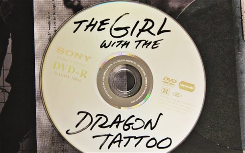 thealicechan:   This is what the official DVD disc for The Girl With the Dragon Tattoo looks like. Naturally, some renters were confused.  OMG another great graphic design packaging example!! 