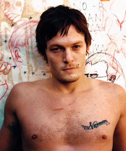 normanreedus:  thisonesforthelaydies:  badass is getting your own name tattooed on your chest  It’s actually his father’s name, who he was named after. When he died, he got “Norman” tattooed on his chest. 