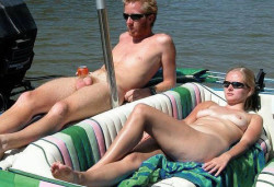 nudistlifestyle:  Nudist couple relaxing in the sun ! 
