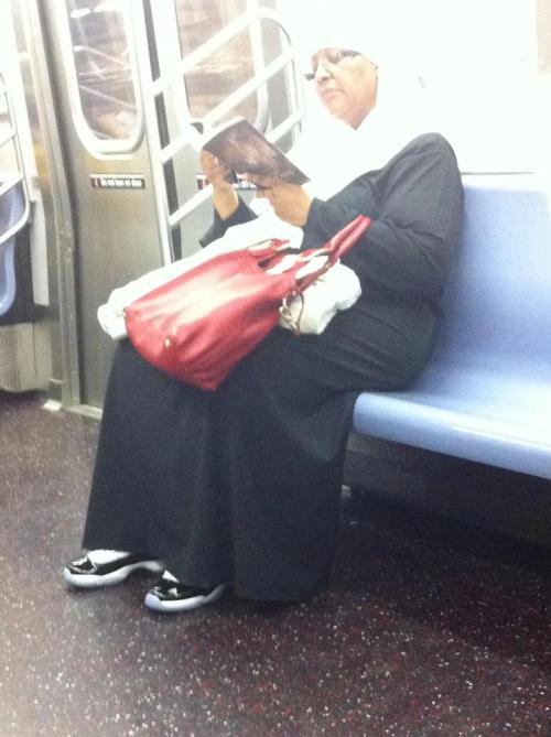 melpopular:lavakicks:Only in NYC would you see a nun wearing Air Jordan 11 “Concords” #WTFShes not a