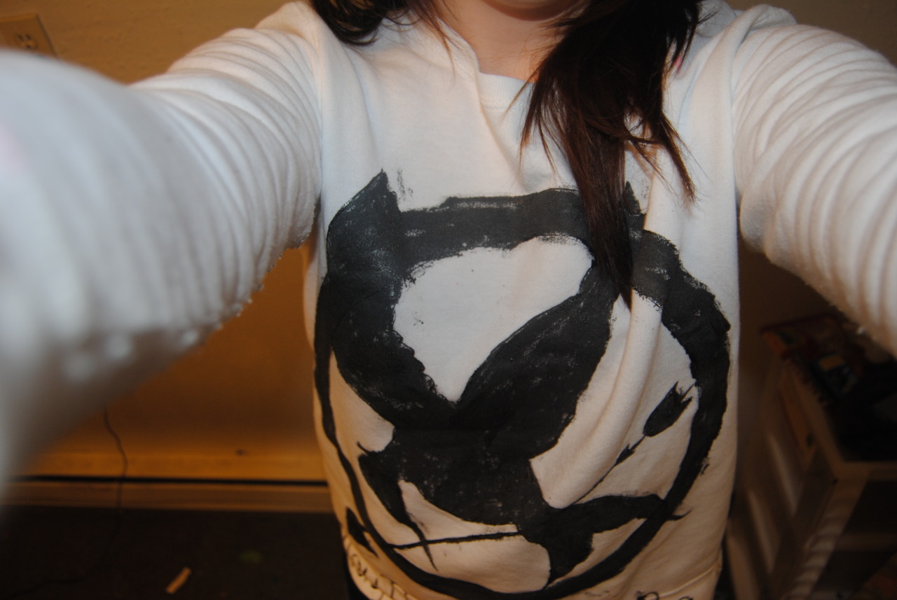 kn0ckturn:  my hunger games shirt for the midnight premiere last night that i made