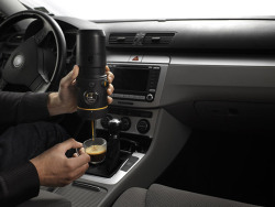 thedailywhat:  Life-Altering Mobile Espresso Maker of the Day: Love driving your car? Hate having to stop driving your car in order to grab an espresso? No longer! Introducing the Handpresso Auto. “Just plug the espresso machine into the 12V cigarette