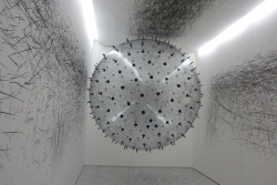 myedol:  Analog Interactive Installation  is an installation made of a helium-inflated sphere trapped inside a small room that’s spiked with dozens of protruding charcoal pieces which scrape the edges of the gallery wall as participants push, toss,