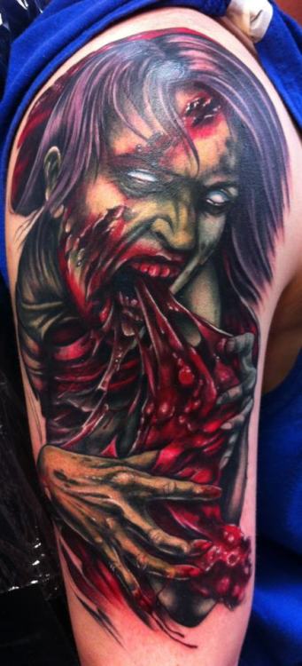 fuckyeahtattoos: This is my boyfriends tattoo . It’s the start to a half sleeve of zombies from the 