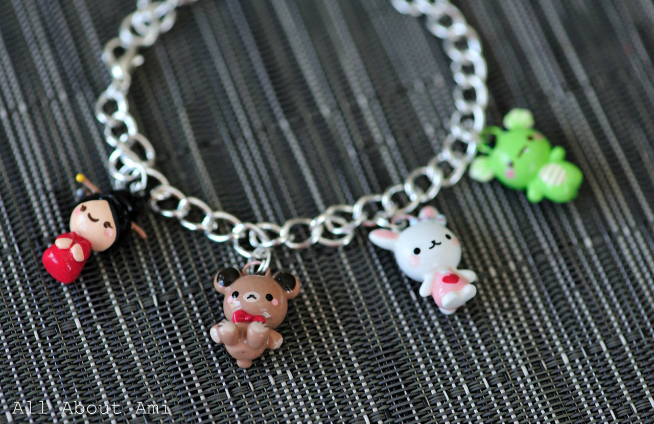 Sneak peek of upcoming blog post: Charm bracelet made by Kim of Oborocharms for our art trade, featuring Chinese New Year Doll, Valentine Teddy, Sweetheart Bunny & Dragon!