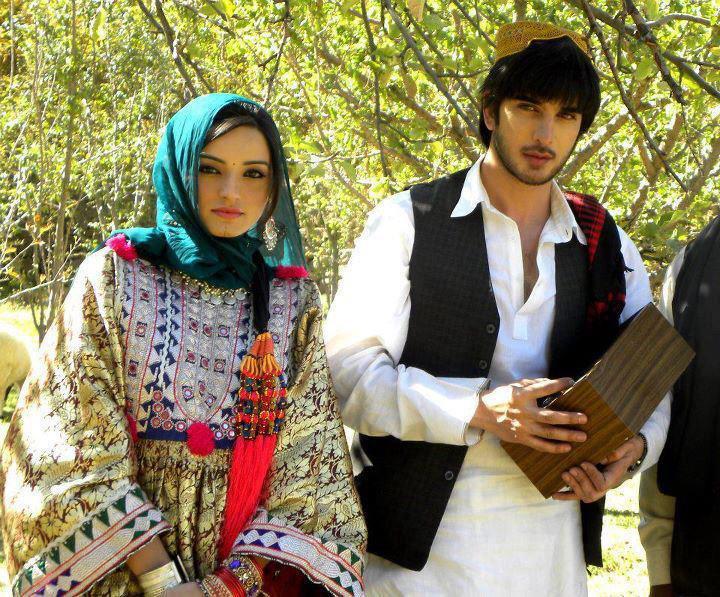 Afghan traditional men and women dress. (Pashtun ethnicity)