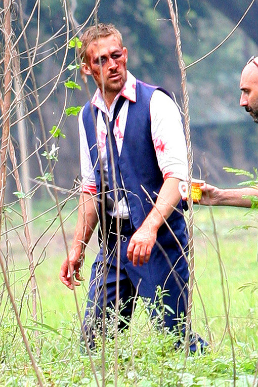 Based on this photo from the set of Ryan Gosling’s new movie, The Gos has decided that he no longer wants to be beautiful. Can you even say “Hey, girl” with a fat lip?