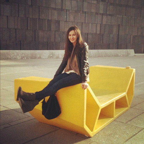 Kasia cross-legged kickin&rsquo; it on Austrian urban bench in front of Leopold Museum housed in the