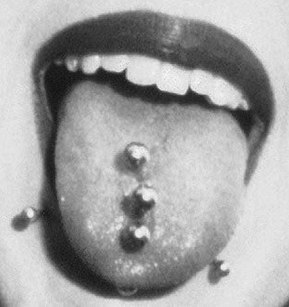 always kind of wanted the triple tongue bar thing. i only have one :L