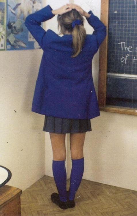 schooluniformspanking:  clare, a new student, is told to stand silently in the corner while i talk w