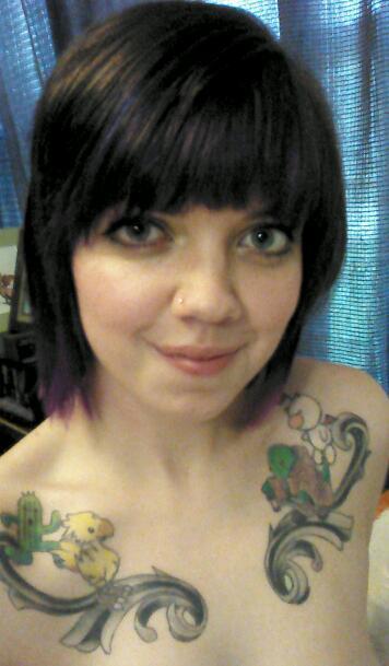 viciousblueyes:  Purple hair. Good shot of my tattoo, as well :)