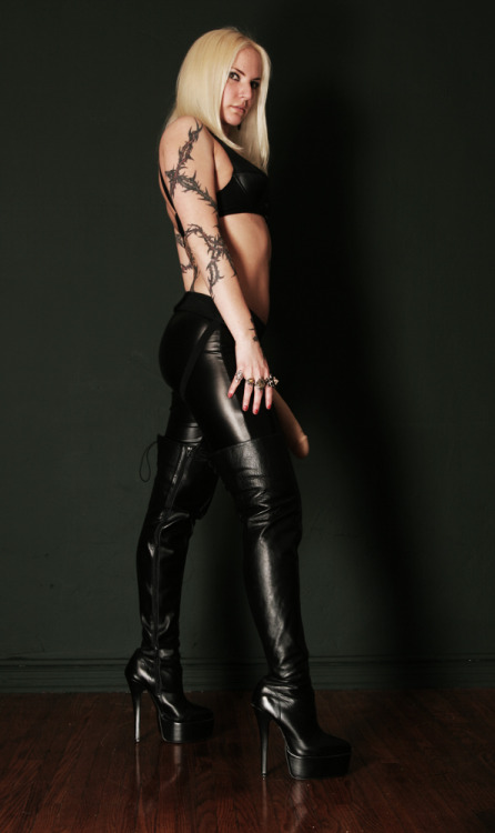 Leather dominatrix thigh high boots