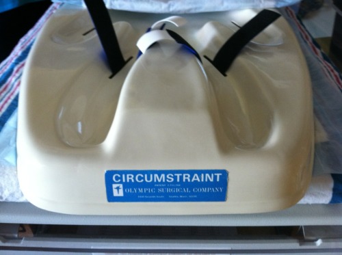 This is what infant boys are strapped down to when circumcision is to be performed. Restrained &