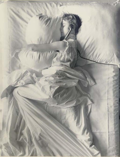 Irving Penn (1917-2009) Girl in Bed on Telephone (Jean Patchett), New York, 1949.