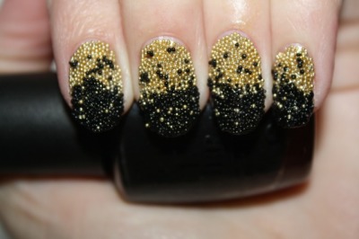 polishyoupretty:
“ CHAMPAGNE & CAVIAR nail art! Click the photo to see the full tutorial from Polish You Pretty! ”