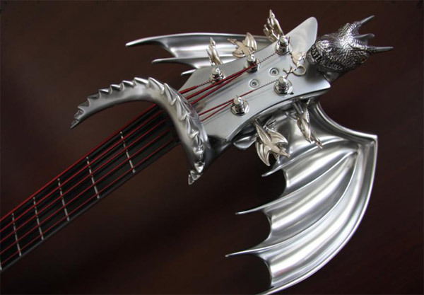 samanfuu:  ianbrooks:  Chrome Dragon Bass Guitar by Emerald Guitars Created as a