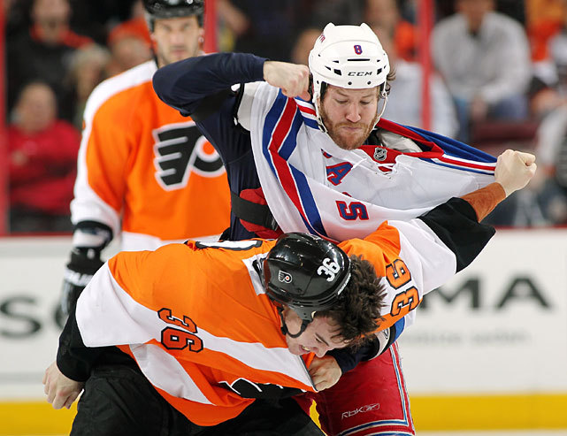 siphotos:
“ Brandon Proust pounds on Zac Rinaldo during last night’s Rangers-Flyers game. New York won 5-3 to clinch the No. 1 playoff seed in the East. (Len Redkoles/NHLI via Getty Images)
VIDEO: Watch highlights of New York’s victory over...